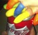 balooned Kid hands-on-cans
